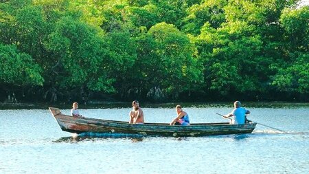 4 people in a boat