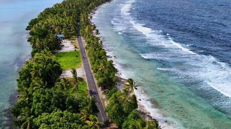 Road in Tuvalu almost underwater as sea levels rise